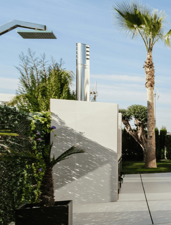 Pr1 Outdoor shower beside a modern villa with palm trees